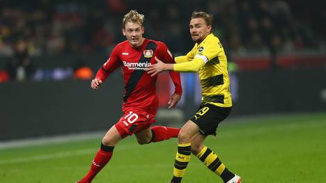 Bayer Leverkusen (l.: Julian Brandt) und Borussia Dortmund (r.: Marcel Schmelzer) wollen in die Champions League