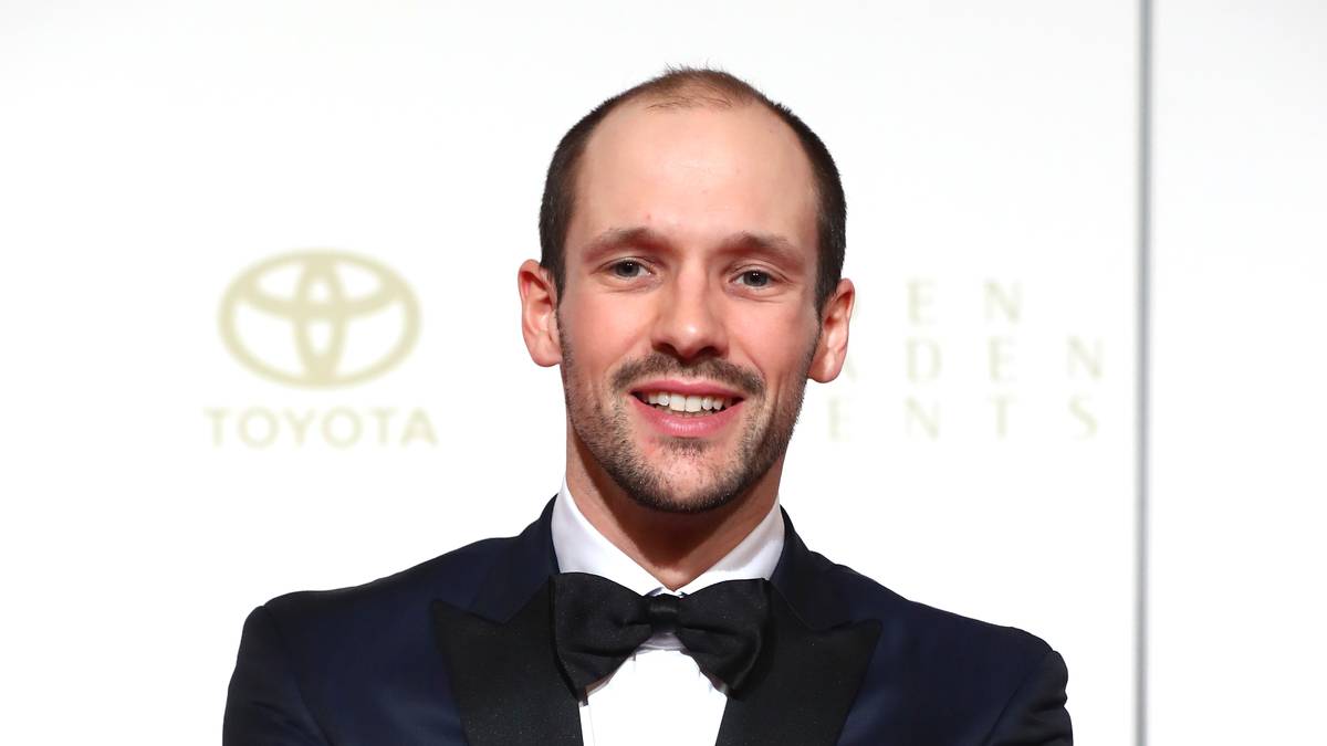 Triathlet und Ironman-Sieger Patrick Lange setzt auf eine Fliege als Accessoire