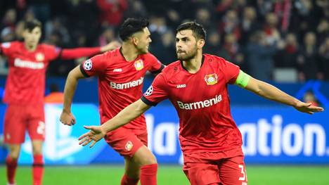 Leverkusen's German forward Kevin Volland celebrates scoring the 2-0 goal with his team-mates during the UEFA Champions League Group D football match Bayer Leverkusen v Atletico Madrid in Leverkusen, western Germany on November 6, 2019. (Photo by INA FASSBENDER / AFP) (Photo by INA FASSBENDER/AFP via Getty Images)
