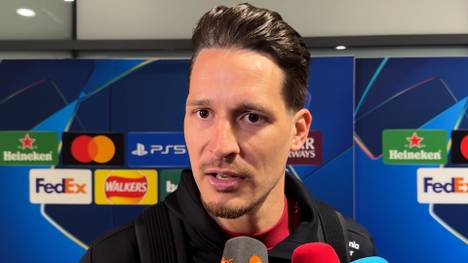 Bayer 04 Leverkusen verliert das Achtelfinal Rückspiel der Champions League gegen Arsenal London mit 0:2. Torhüter Janis Blaswich überzeugte trotz der Niederlage und spricht nach der Partie über seine Leistung sowie den bevorstehenden Konkurrenzkampf mit dem eigentlichen Stammkeeper Mark Flekken.