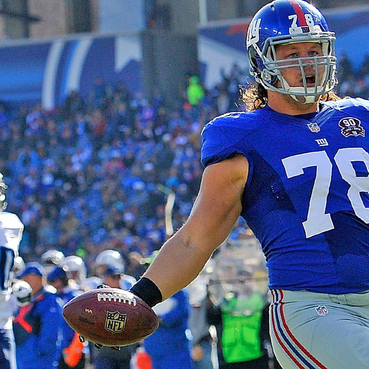 New York Giants defensive tackle Markus Kuhn (78) is fired up after an  interception by a teammate in an NFL football game between the New York  Giants and Dallas Cowboys on Sunday