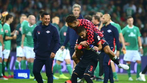 Leipzig's players react after winning the German first division Bundesliga football match between Werder Bremen and RB Leipzig in Bremen, northwestern Germany, on September 21, 2019. (Photo by PATRIK STOLLARZ / AFP) / DFL REGULATIONS PROHIBIT ANY USE OF PHOTOGRAPHS AS IMAGE SEQUENCES AND/OR QUASI-VIDEO        (Photo credit should read PATRIK STOLLARZ/AFP/Getty Images)
