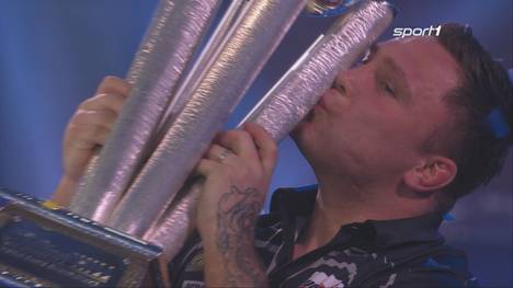 Gerwyn Price sichert sich mit einem 7:3 gegen den "Flying Scotsman" den Titel bei der Darts-Weltmeisterschaft und feiert danach ausgelassen. 