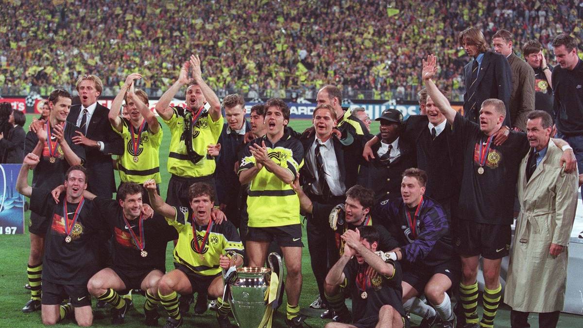 Platz 13: BORUSSIA DORTMUND - 13 Teilnahmen, zwei Finals und ein Titelgewinn. 1997 holt sich der BVB bei seiner zweiten Teilnahme den Henkelpott von Titelverteidiger Juventus Turin. Zweimal Karl-Heinz Riedle sowie der erst Sekunden zuvor eingewechselte Lars Ricken erzielen die Treffer beim 3:1 Sieg im Münchner Olympiastadion
