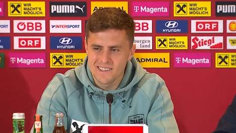 Christoph Baumgartner hätte seinen frisch aufgestellten Weltrekord für das schnellste Länderspieltor am selben Tag fast an Florian Wirtz verloren. Der ÖFB-Teamspieler witzelt über seine Bestmarke.