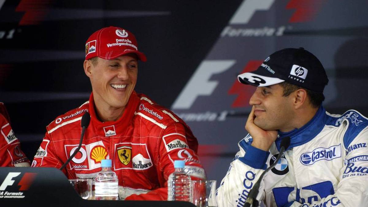 Michael Schumacher und Juan Pablo Montoya im Jahr 2004