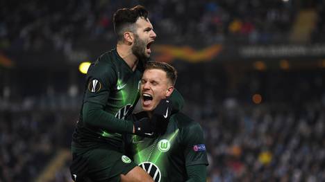 MALMO, SWEDEN - FEBRUARY 27: Yannick Gerhardt of VfL Wolfsburg celebrates with Renato Steffen after scoring his team's second goal during the UEFA Europa League round of 32 second leg match between Malmo FF and VfL Wolfsburg at Swedbank Stadion on February 27, 2020 in Malmo, Sweden. (Photo by Stuart Franklin/Bongarts/Getty Images)