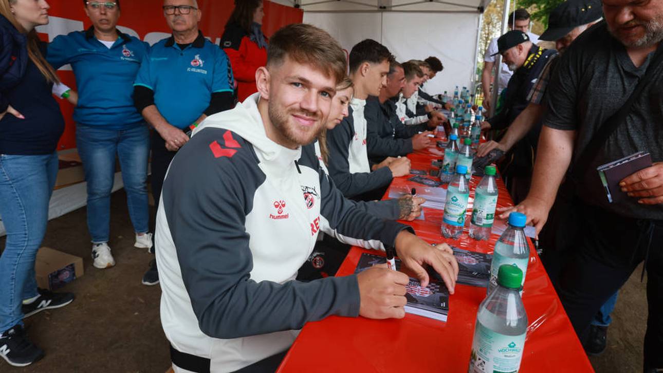 Jan Thielmann schreibt Autogramme