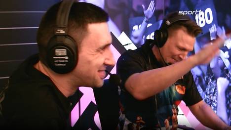 Christian Kist spielt den ersten 9-Darter bei der Darts WM 2025 und die Sport1-Kommentatoren Basti Schwele und Robert Marijanovic eskalieren in der Kommentatorenbox.