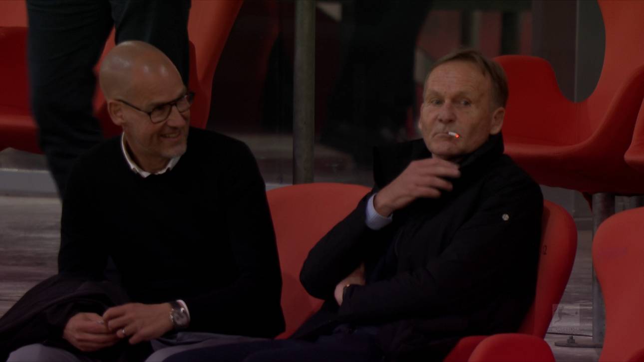Hans-Joachim Watzke (r.) rauchte nach dem BVB-Sieg im Bayern-Stadion
