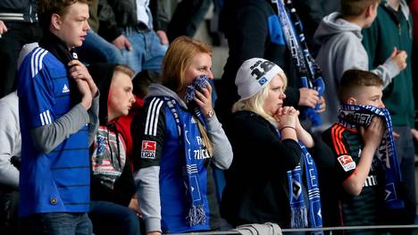 Hamburg Fans Watch The Bundesliga Playoff Match
