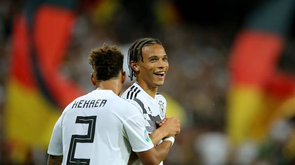 MAINZ, GERMANY - JUNE 11: Leroy Sane (L) of Germany celebrates scoring the 8th goal with team mate Thilo Kehrer during the UEFA Euro 2020 Qualifier match between Germany and Estonia at Opel Arena on June 11, 2019 in Mainz, Germany. (Photo by Alexander Hassenstein/Bongarts/Getty Images)