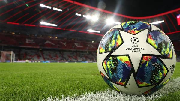 MUNICH, GERMANY - NOVEMBER 06: A detailed view of a match ball on the pitch ahead of the UEFA Champions League group B match between Bayern Muenchen and Olympiacos FC at Allianz Arena on November 06, 2019 in Munich, Germany. (Photo by Alexander Hassenstein/Bongarts/Getty Images)