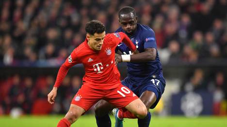 MUNICH, GERMANY - DECEMBER 11: Philippe Coutinho of FC Bayern Munich is challenged by Moussa Sissoko of Tottenham Hotspur during the UEFA Champions League group B match between Bayern Muenchen and Tottenham Hotspur at Allianz Arena on December 11, 2019 in Munich, Germany. (Photo by Sebastian Widmann/Bongarts/Getty Images)