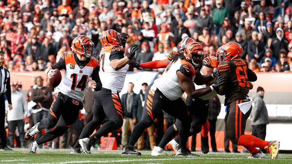 CLEVELAND, OH - DECEMBER 8:  Andy Dalton #14 of the Cincinnati Bengals runs with the ball during the first quarter of the game against the Cleveland Browns at FirstEnergy Stadium on December 8, 2019 in Cleveland, Ohio. (Photo by Kirk Irwin/Getty Images)