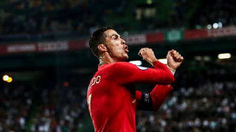 Portugal's forward Cristiano Ronaldo celebrates after scoring a goal during the Euro 2020 qualifier group B football match between Portugal and Luxembourg at the Jose Alvalade stadium in Lisbon on October 11, 2019. (Photo by CARLOS COSTA / AFP) (Photo by CARLOS COSTA/AFP via Getty Images)