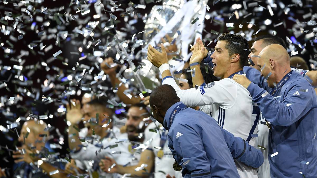 CARDIFF, WALES - JUNE 03:  Cristiano Ronaldo of Real Madrid celebrates with his team mates after victory in the UEFA Champions League Final between Juventus and Real Madrid at National Stadium of Wales on June 3, 2017 in Cardiff, Wales.  (Photo by Laurence Griffiths/Getty Images)