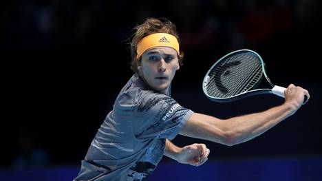 LONDON, ENGLAND - NOVEMBER 16: Alexander Zverev of Germany plays a backhand in his semi-final singles match against Dominic Thiem of Austria during Day Seven of the Nitto ATP World Tour Finals at The O2 Arena on November 16, 2019 in London, England. (Photo by Julian Finney/Getty Images)