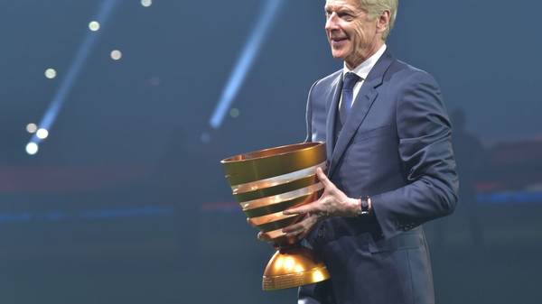 Former Arsenal manager Arsene Wenger arrives with the trophy ahead of the French League Cup final football match Guingamp vs Strasbourg, on March 30, 2019 at the Pierre-Mauroy stadium in Villeneuve-d'Ascq. (Photo by Philippe HUGUEN / AFP)        (Photo credit should read PHILIPPE HUGUEN/AFP via Getty Images)