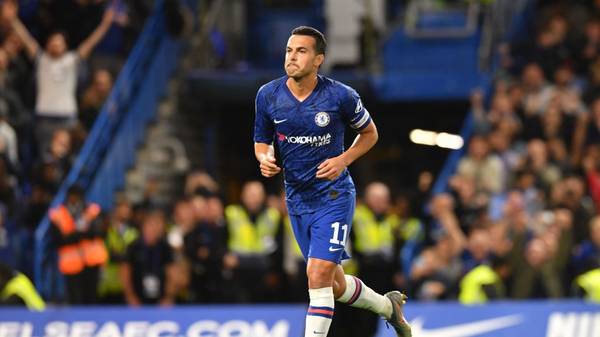 Chelsea's Spanish midfielder Pedro celebrates scoring his team's third goal during the English League Cup third round football match between Chelsea and Grimsby Town at Stamford Bridge in south west London, on September 25, 2019. (Photo by OLLY GREENWOOD / AFP) / RESTRICTED TO EDITORIAL USE. No use with unauthorized audio, video, data, fixture lists, club/league logos or 'live' services. Online in-match use limited to 120 images. An additional 40 images may be used in extra time. No video emulation. Social media in-match use limited to 120 images. An additional 40 images may be used in extra time. No use in betting publications, games or single club/league/player publications. /         (Photo credit should read OLLY GREENWOOD/AFP via Getty Images)