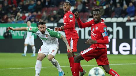 AUGSBURG, GERMANY - DECEMBER 07: Marco Richter of FC Augsburg shoots during the Bundesliga match between FC Augsburg and 1. FSV Mainz 05 at WWK-Arena on December 07, 2019 in Augsburg, Germany. (Photo by Alexander Hassenstein/Bongarts/Getty Images)