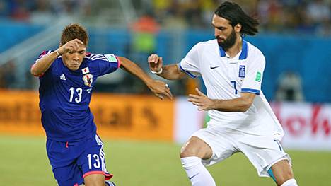 Yoshito Okubo (l.) schied mit Japan in der WM-Vorrunde aus