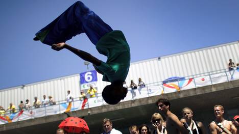 A South African gymnast jumps during the