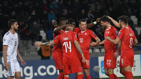 Switzerland's players celebrate their second goal during the Euro 2020 football qualification match between Georgia and Switzerland in Tbilisi on March 23, 2019. (Photo by Vano Shlamov / AFP)        (Photo credit should read VANO SHLAMOV/AFP via Getty Images)