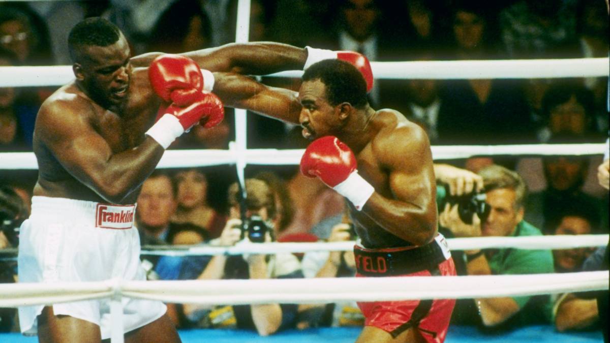 PLATZ 12 - EVANDER HOLYFIELD: Mit einem K.o.-Sieg über Mike Tysons Bezwinger Buster Douglas stieg Holyfield 1990 zum Champion auf - und bewies in den Jahren darauf, dass das kein glücklicher Zufall war