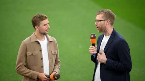 Per Mertesacker (re.) mit Christoph Kramer