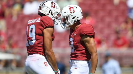 Osiris St. Brown (r.) und seinem Bruder Amon-Ra gelangen je Catches über 53 Yards Osiris St. Brown (r.) feiert seinen Touchdown gegen die UCLA Bruins