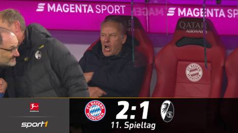 Der FC Bayern bezwingt den SC Freiburg im Top-Spiel. Leon Goretzka und Robert Lewandowski treffen zum Sieg. Einige Bayern-Fans fallen mit einem provokanten Plakat auf.
