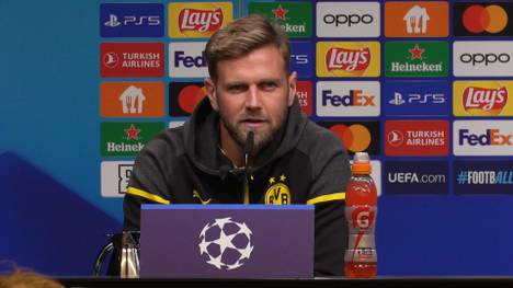 Niclas Fülkrug spricht über das bevorstehende Spiel in der Champions League gegen AC Mailand und verteidigt die Spielweise des BVB. 