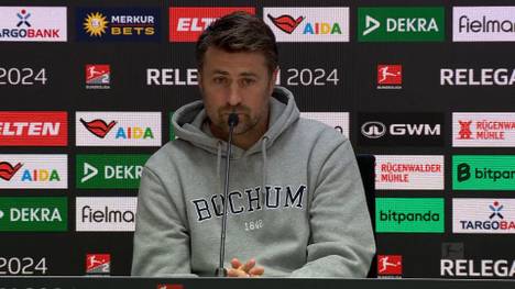 Heiko Butscher kassiert mit dem VfL Bochum im Relegations-Hinspiel gegen Fortuna Düsseldorf eine herbe Klatsche. Nach dem Spiel erklärt der Trainer, warum er neben Manuel Riemann auch auf Kapitän Anthony Losilla verzichtete.