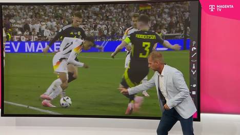 Jamal Musiala überzeugt im Eröffnungsspiel der UEFA EURO 2024 mit seinen Dribblings. MagentaTV-Moderator Jan Henkel führt einen neuen Begriff für seine Bewegungen ein.