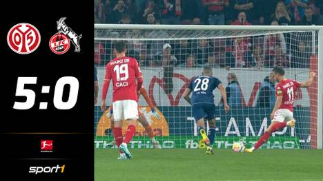 Der 1. FSV Mainz bricht gegen den 1. FC Köln den Heimspiel-Bann, schiebt sich mit einem Rekordsieg sogar auf einen Champions-League-Rang. Diskussionen gibt es aber um einen Strafstoß.